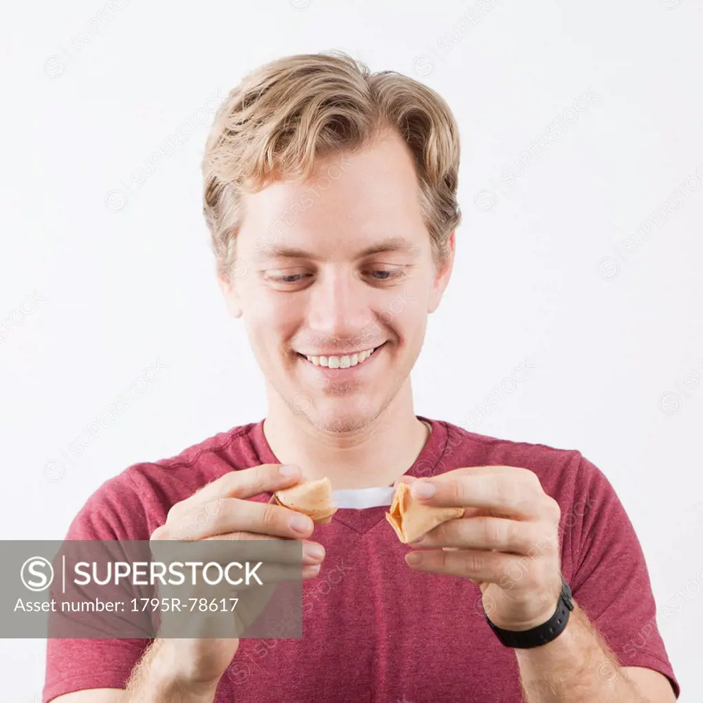 Man holding fortune cookie