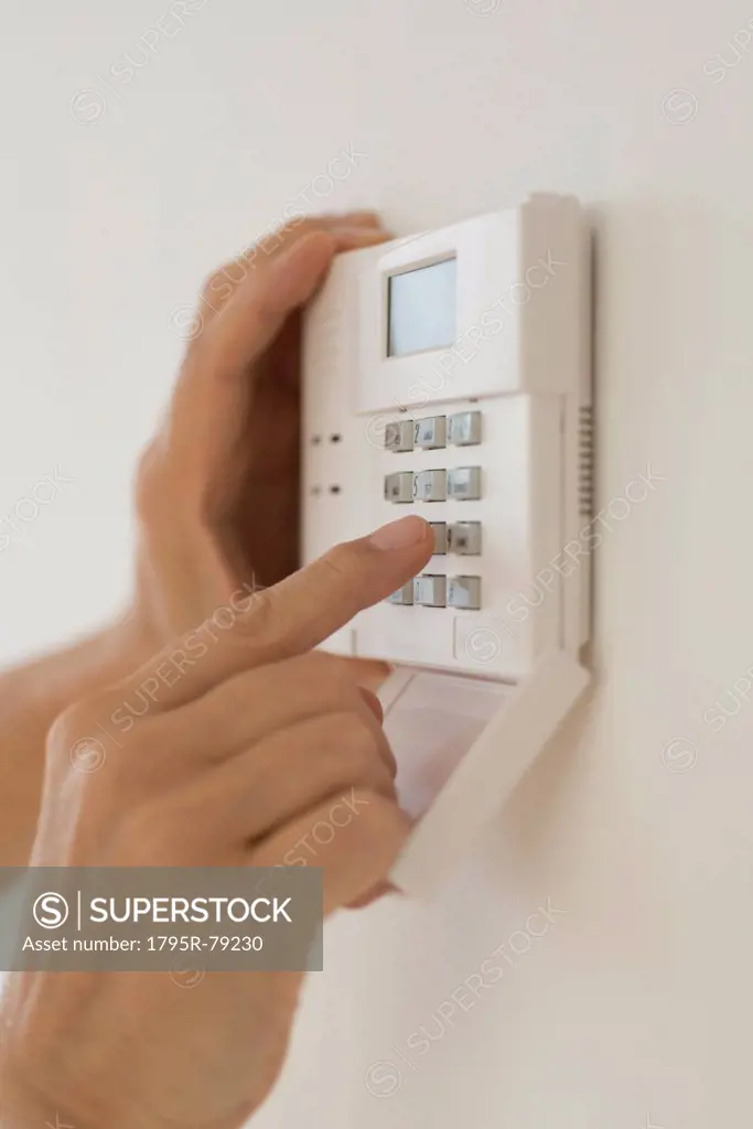 Hand setting code on burglar alarm