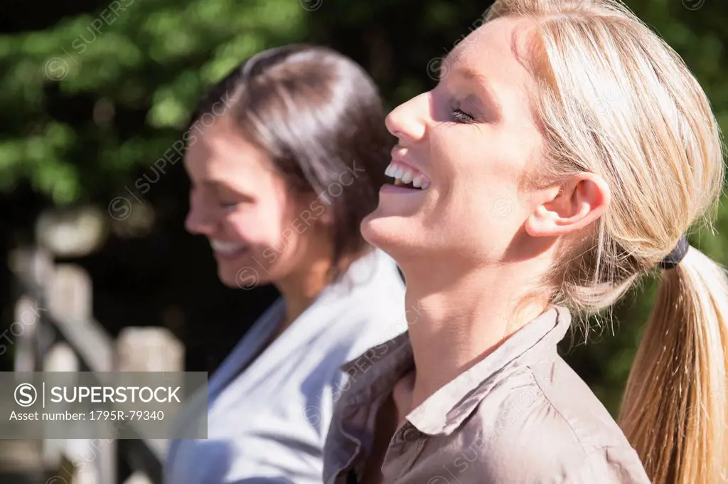 Two women smiling outdoors