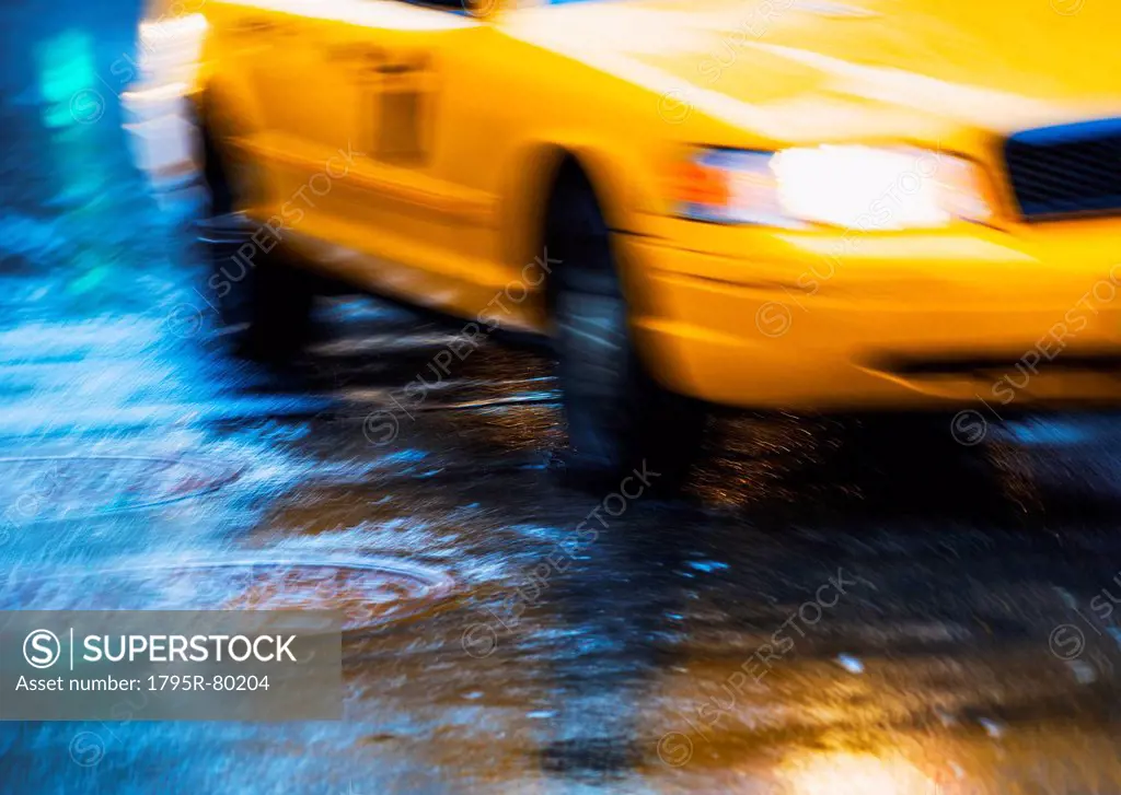Yellow cab in blurred motion