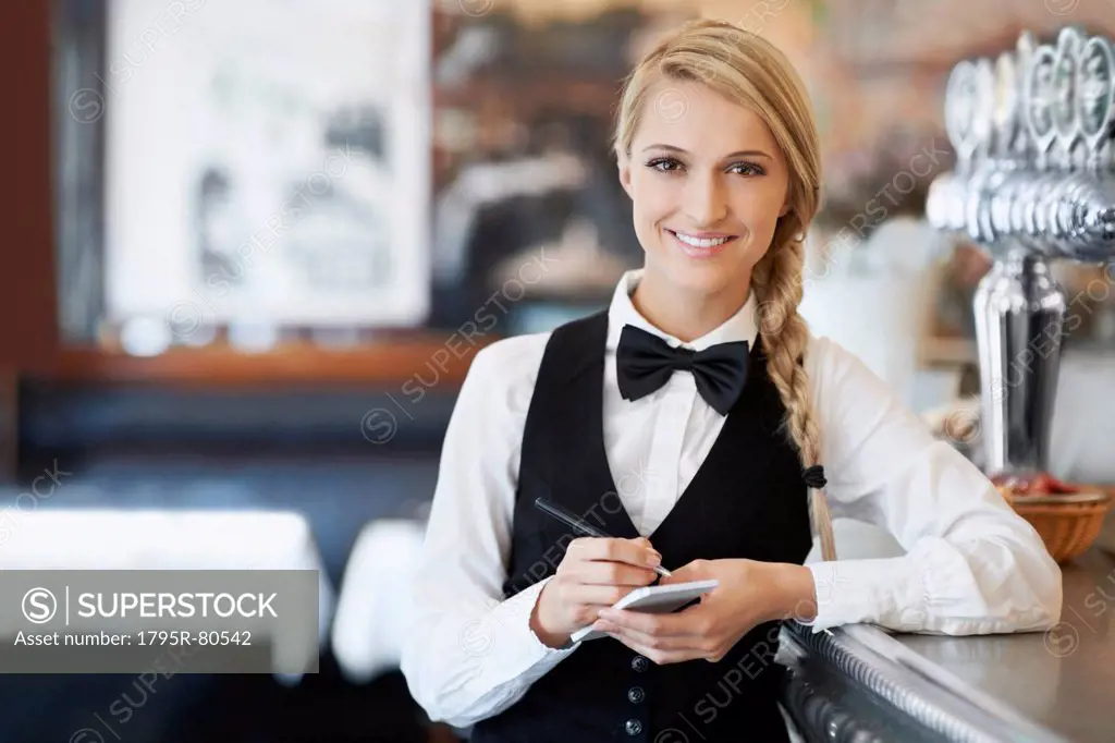 Portrait of smiling waitress