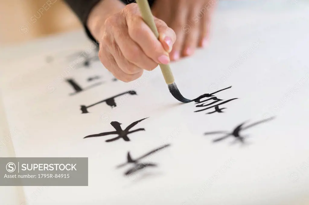 Female hand and japanese calligraphy