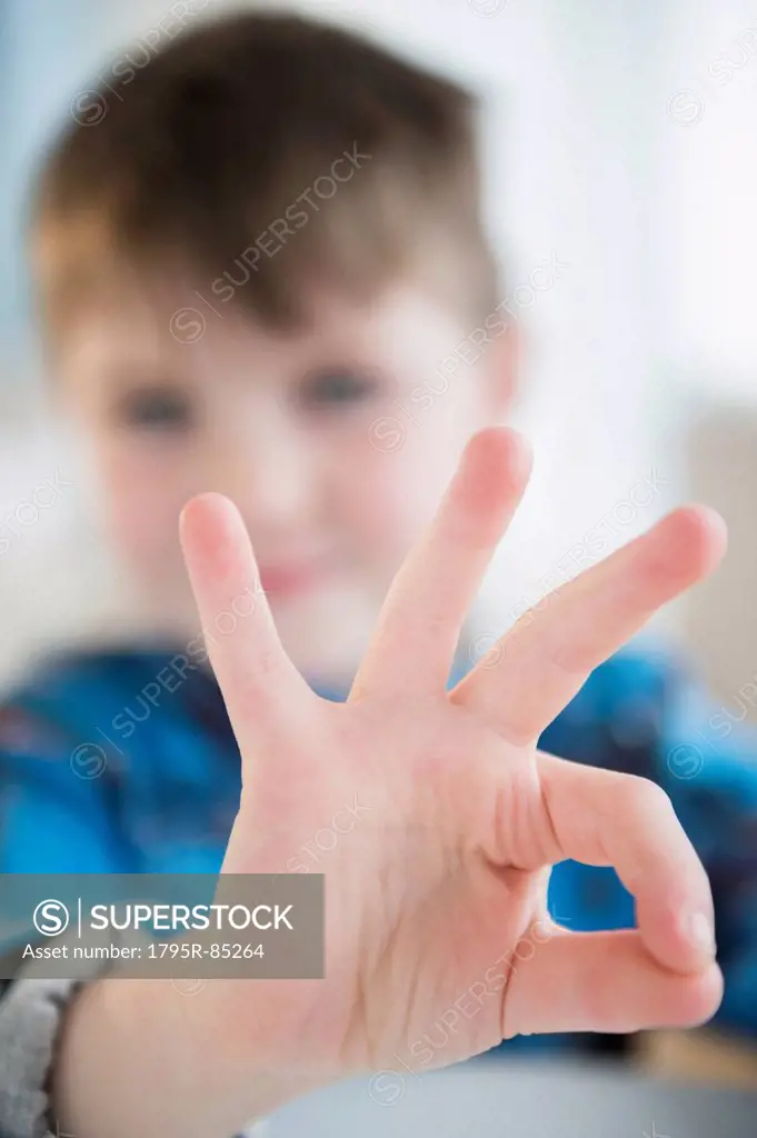 Close up of boy's hand (4-5) gesturing