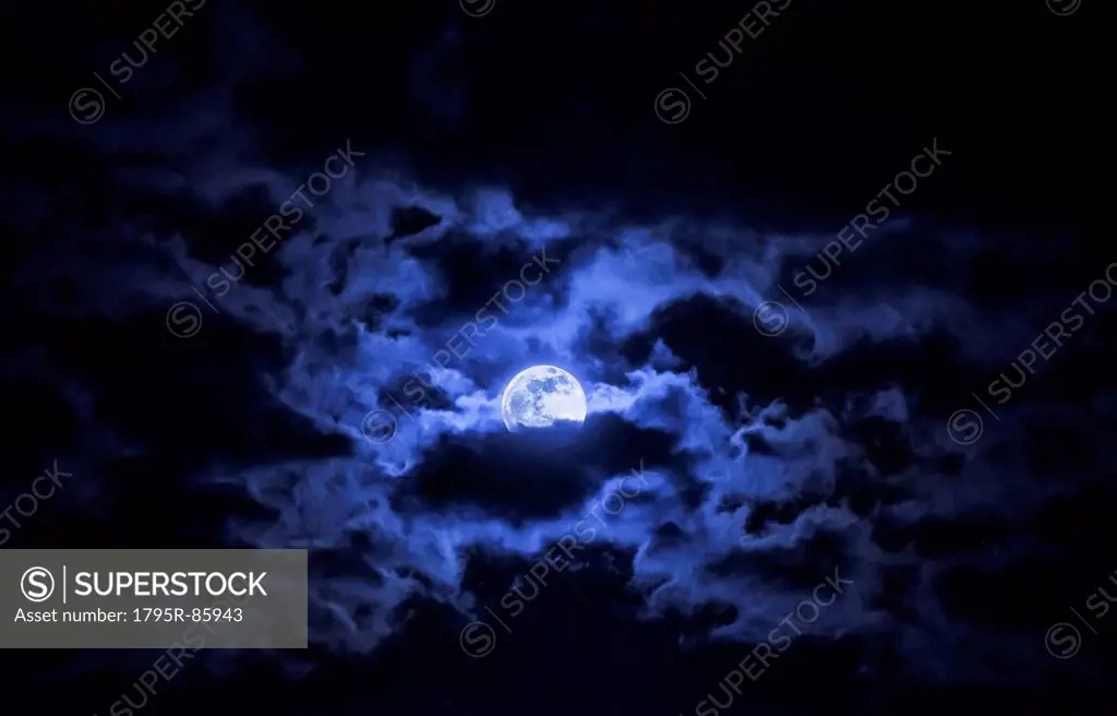 Dramatic sky with full moon