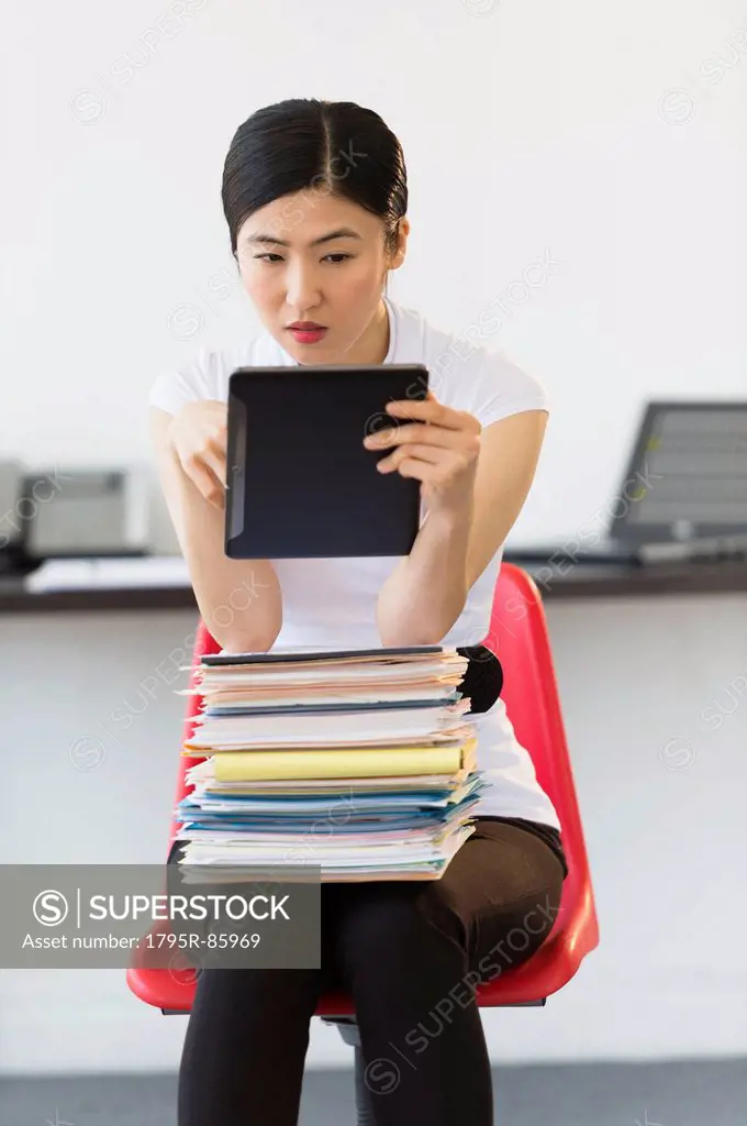 Businesswoman using tablet pc
