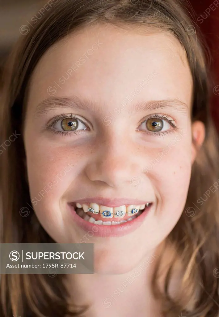 Girl (8-9) showing braces