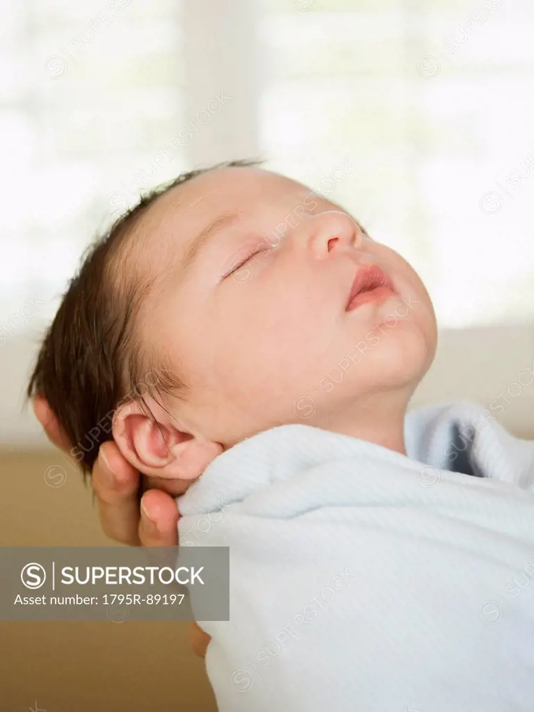 Portrait of newborn baby boy (0-1 months) sleeping