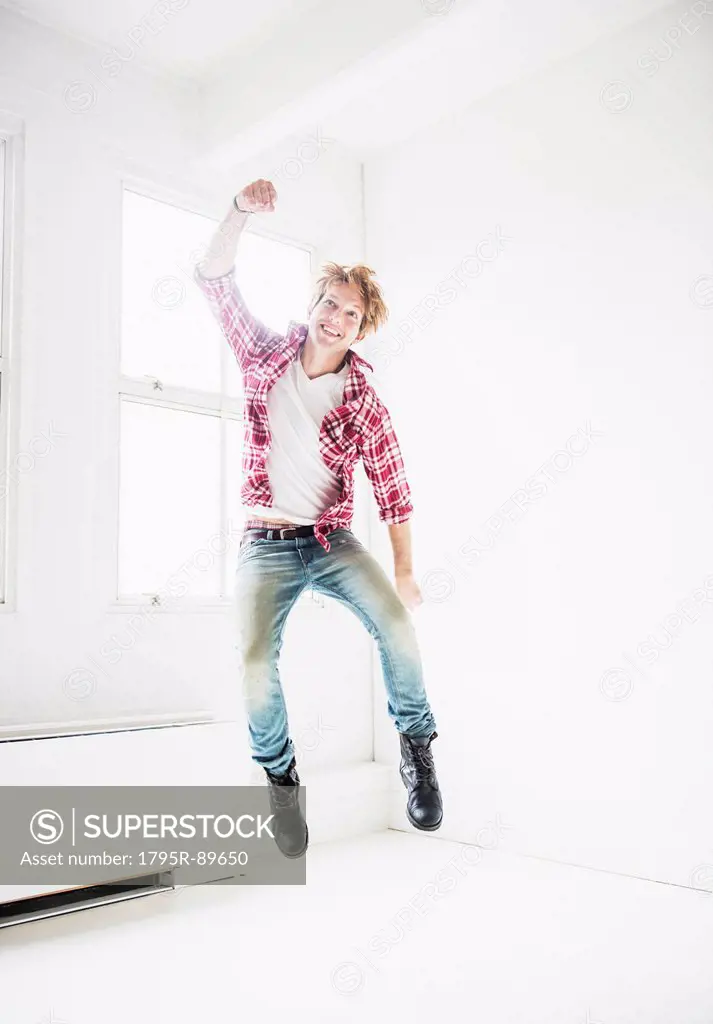 Man jumping in room