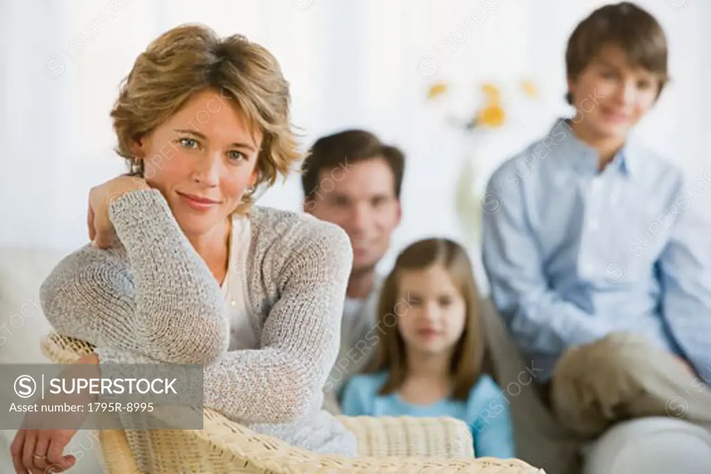 Woman in front of family