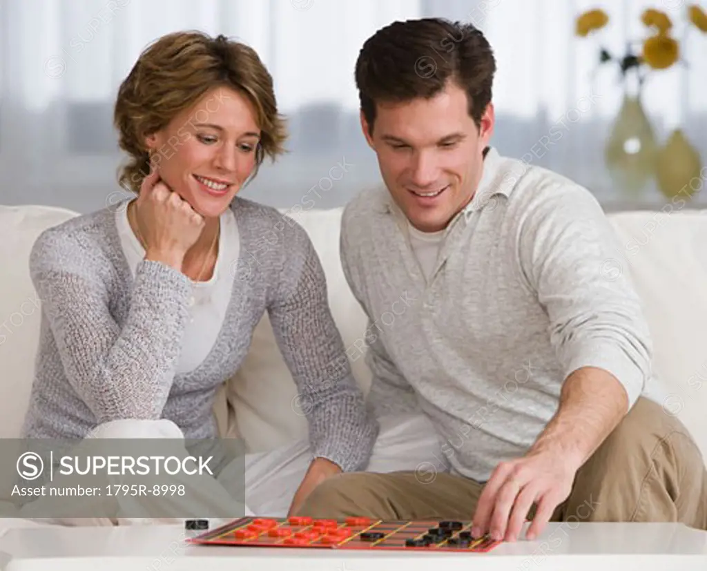 Couple playing checkers