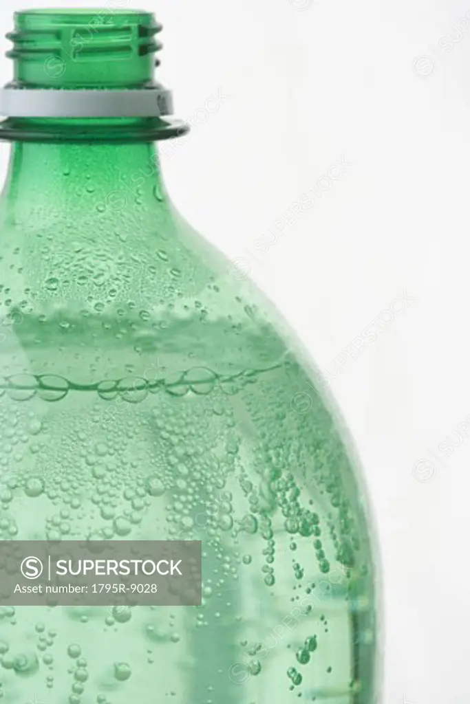 Profile of green plastic soda bottle