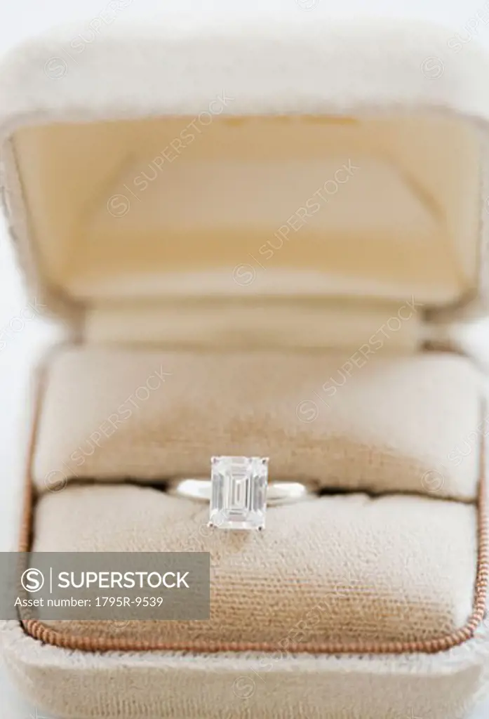 Close-up of diamond engagement ring in box