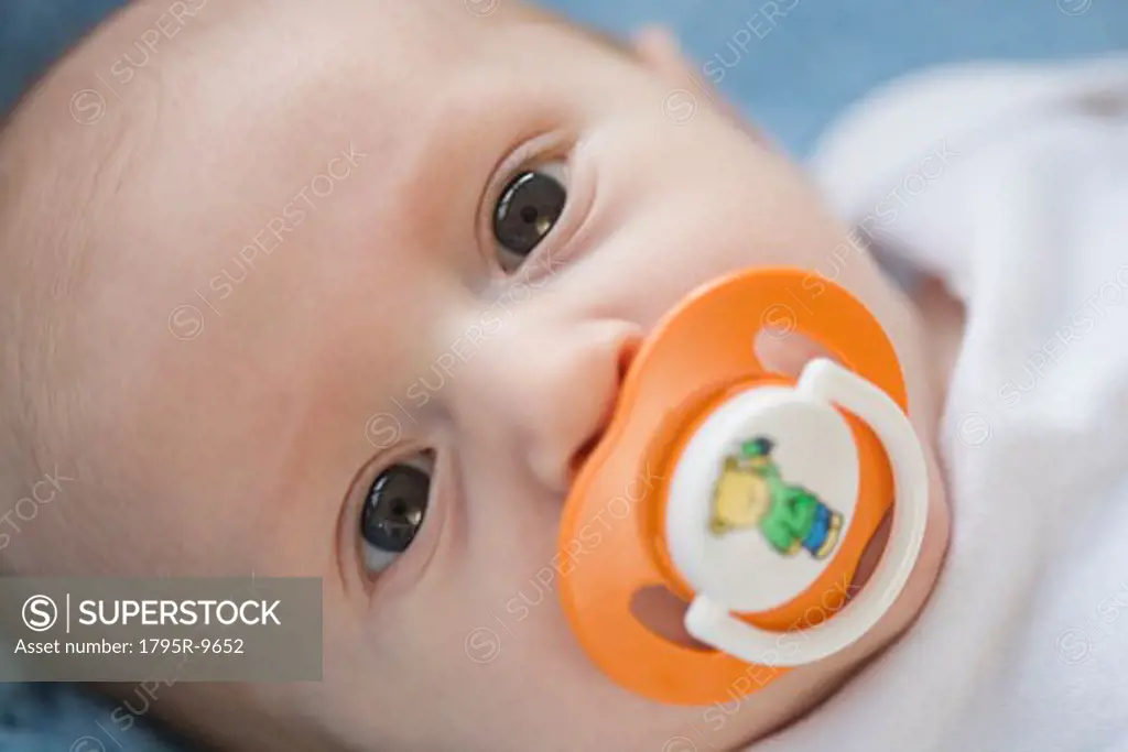 Close-up of baby with pacifier