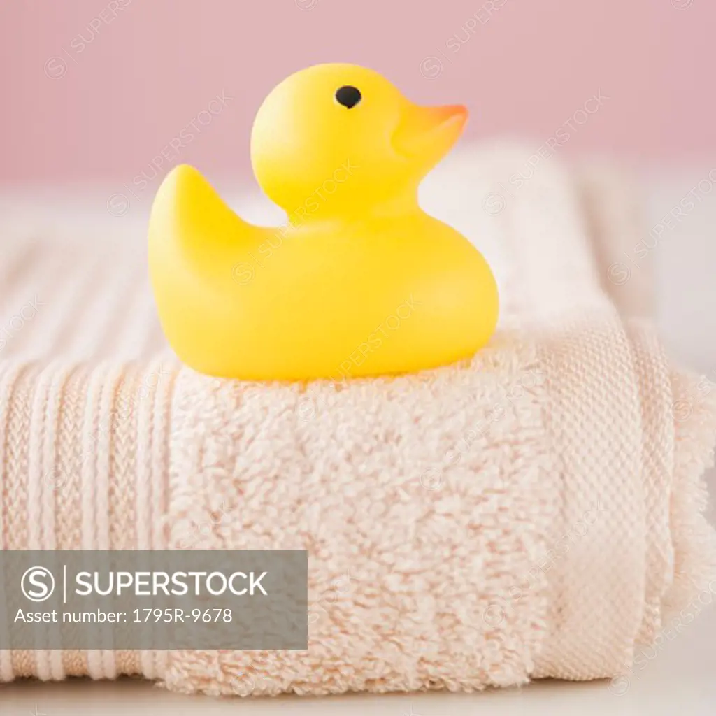 Close-up of toy duck on towel