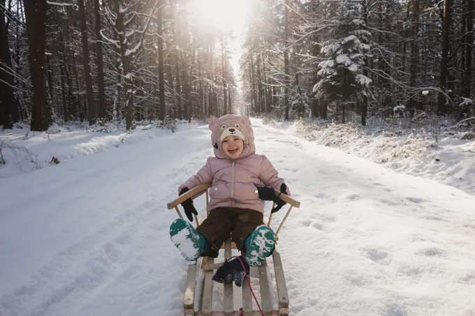 , Poland, Subcarpathia, Girl having fun in winter