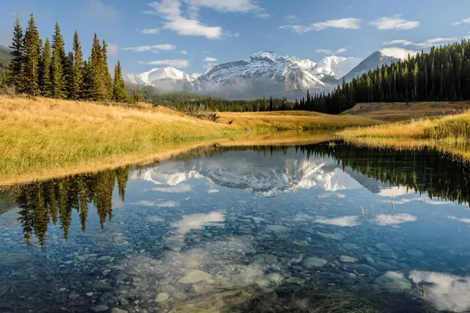 Canada, Alberta, Banff, Mountain peak reflecting in lake