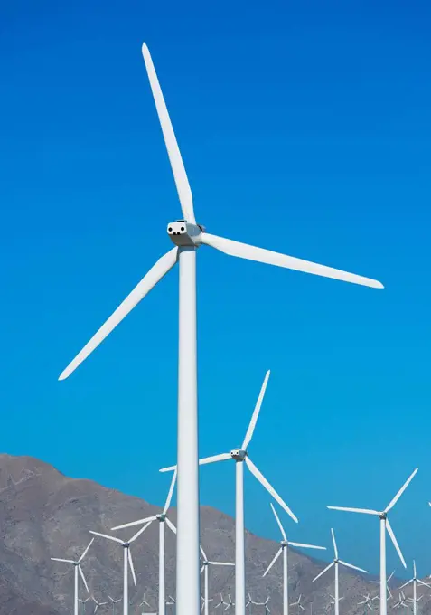 USA, California, Palm Springs, Wind turbines against blue sky
