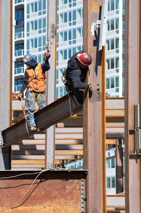 USA, New York, Long Island, New York City, Male workers on construction site