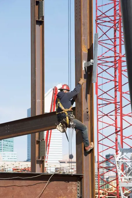 USA, New York, Long Island, New York City, Male worker on construction site