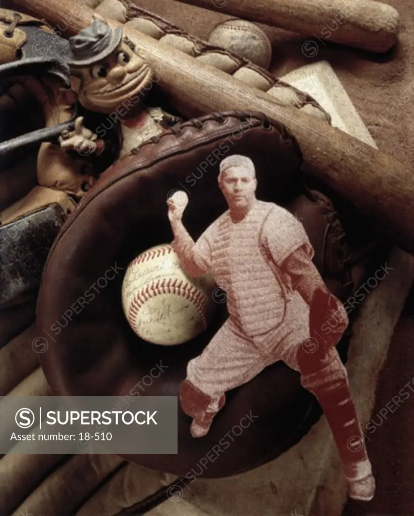Close-up of a cutout of a baseball player with baseball memorabilia