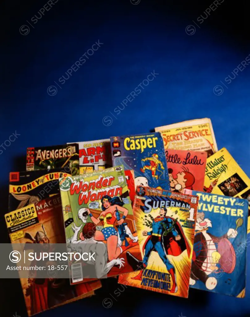 Close-up of a group of comic books