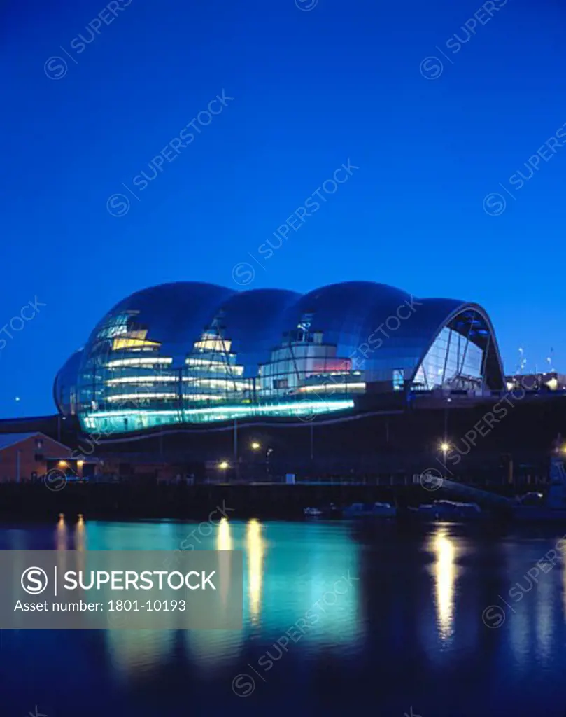 SAGE CENTRE, GATESHEAD, TYNE AND WEAR, UNITED KINGDOM, GENERAL VIEW, DUSK FROM ACROSS THE TYNE, FOSTER AND PARTNERS