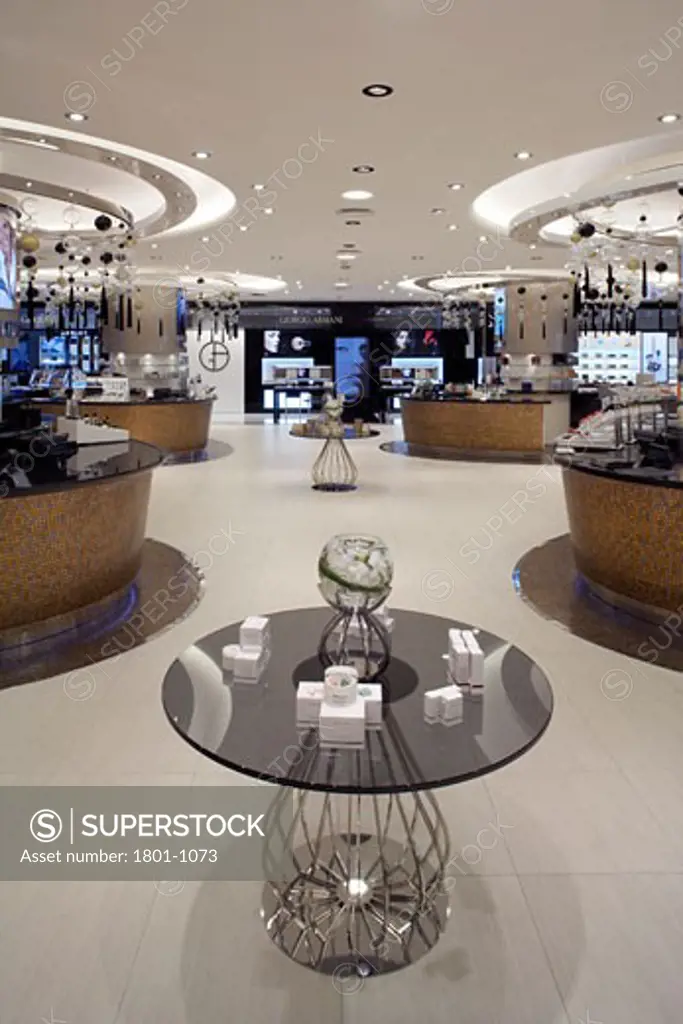 HARVEY NICHOLS DEPARTMENT STORE, KANYON SHOPPING MALL, ISTANBUL, TURKEY, INTERIOR OF THE MAKEUP AND COSMETICS AREA ON THE LOWER GROUND FLOOR, WITH DISPLAY TABLE IN THE MIDDLE OF THE FRAME., FOUR IV DESIGN