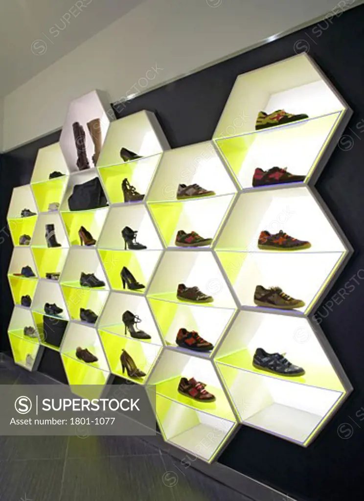 HARVEY NICHOLS DEPARTMENT STORE, KANYON SHOPPING MALL, ISTANBUL, TURKEY, DETAIL OF THE BACKLIT DISPLAY WALL IN THE SHOE SECTION OF THE CASUALWARE DEPT ON THE LOWER GROUND FLOOR., FOUR IV DESIGN