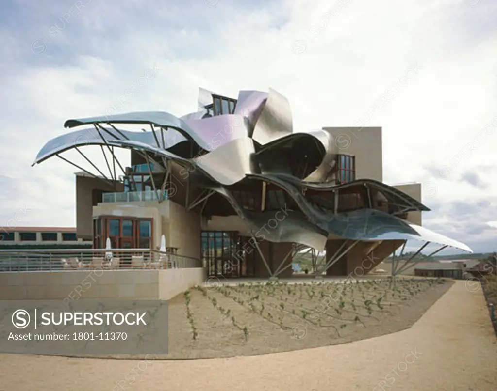 BODEGAS MARQUES DE RISCAL, ELCIEGO, ALAVA-BASQUE COUNTY, SPAIN, MORNING VIEW OF THE MAIN BUILDING WITH VINEYARDS, FRANK GEHRY
