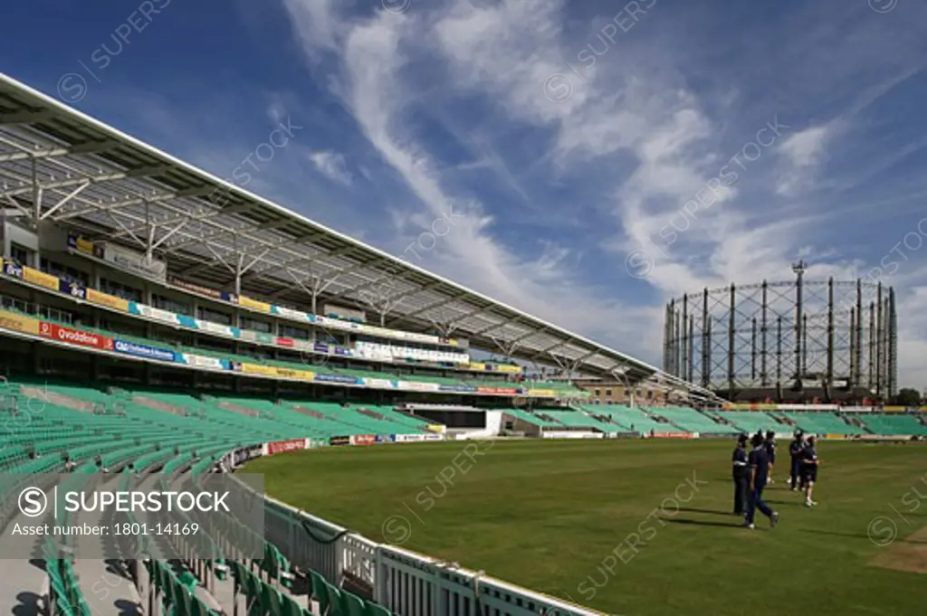 OCS STAND, KENNINGTON OVAL, LONDON, SE11 KENNINGTON, UNITED KINGDOM, STAND VIEWED WITH CRICKETERS PRACTICING, HOK SPORT/THE MILLER PARTNERSHIP