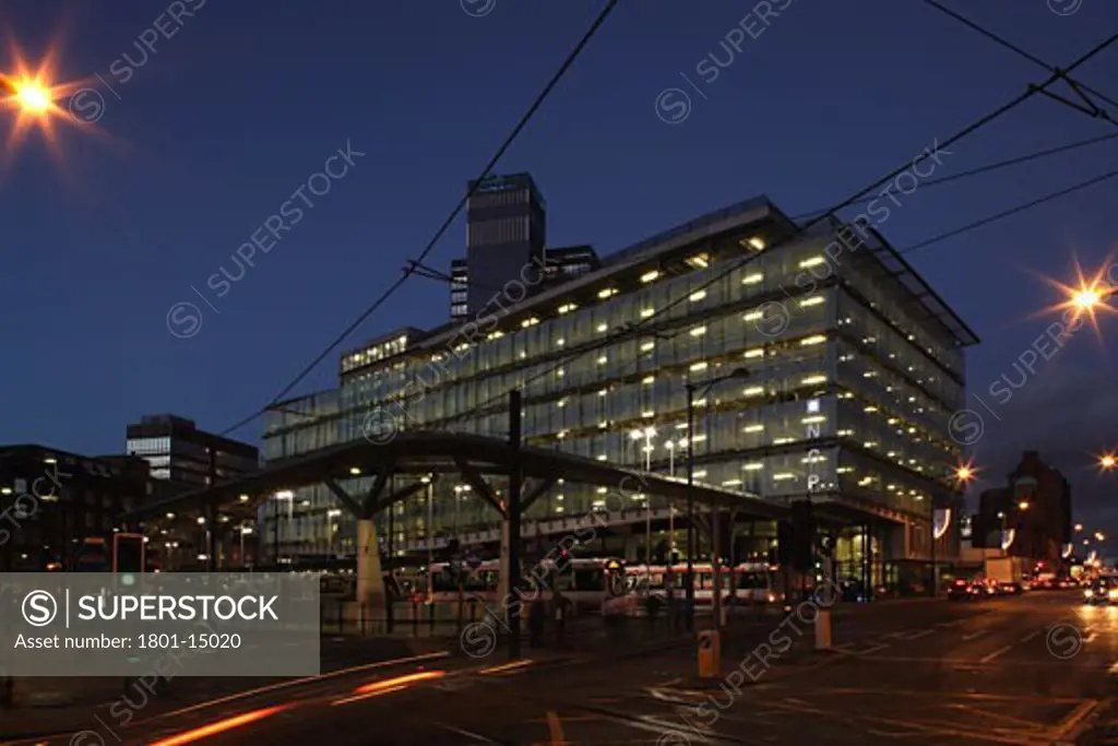 MANCHESTER TRANSPORT INTERCHANGE, SHUDEHILL, NORTHERN QUATER, MANCHESTER, UNITED KINGDOM, DUSK VIEW OF BUS/TRAM STATION AND NCP CARPARK, IAN SIMPSON ARCHITECTS
