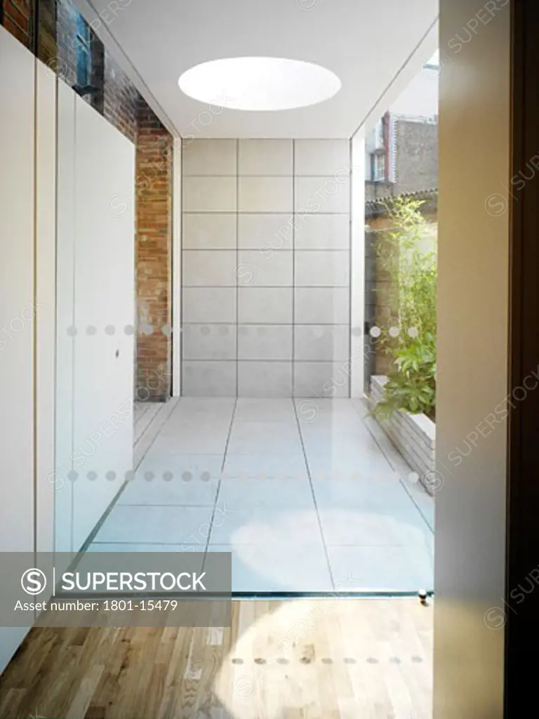 OUR LADY OF HAL PRESBYTERY, ARUCHTON STREET, LONDON, NW1 CAMDEN TOWN, UNITED KINGDOM, COURTYARD VIEW FROM MAIN HALL IN SUNSHINE, JOHN KERR ASSOCIATES