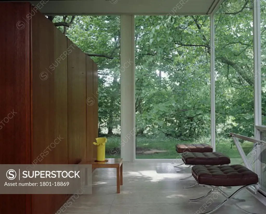 FARNSWORTH HOUSE, FOX RIVER, ILLINOIS, UNITED STATES, INTERIOR WITH LEATHER CHAIRS, LOOKING OUT TO THE GARDEN, LUDWIG MIES VAN DER ROHE