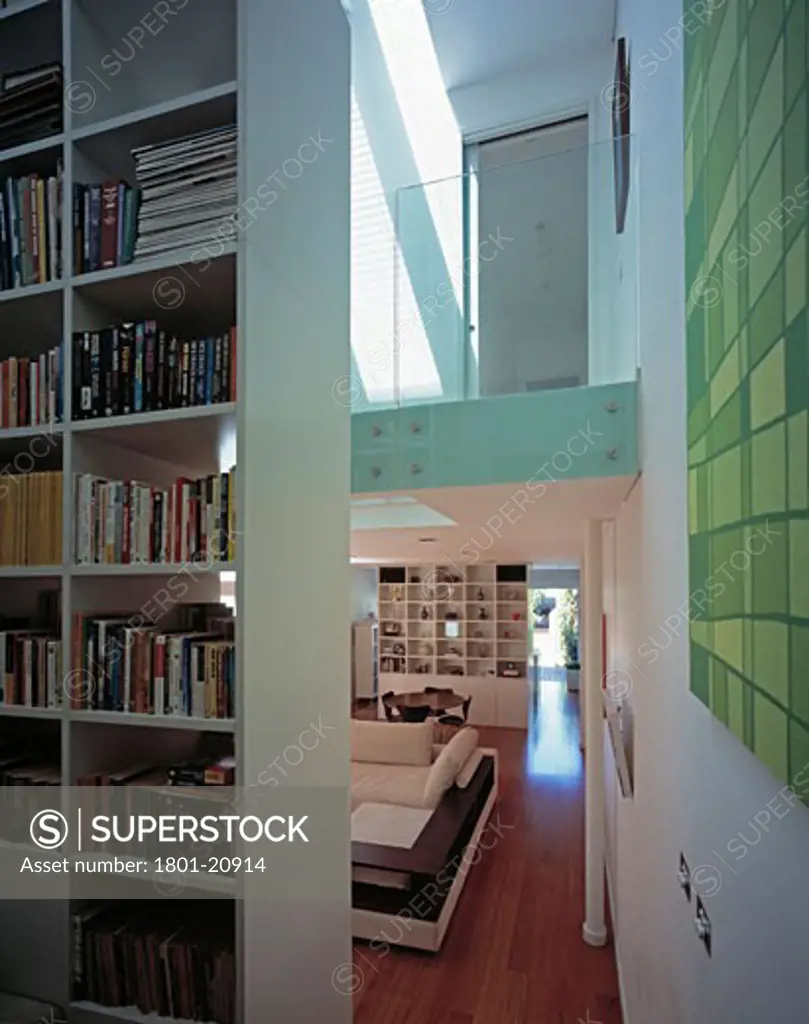 QUEENS PARK HOUSE, SYDNEY, NEW SOUTH WALES, AUSTRALIA, VIEW FROM ENTRY OF BOOKCASE, UPPER LEVEL, LIVINGROOM, PETER CLARK ARCHITECTS