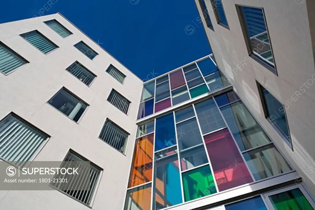 HEART OF HOUNSLOW - CENTRE FOR HEALTH, 92 BATH ROAD, HOUNSLOW, MIDDLESEX, UNITED KINGDOM, DETAIL OF SOUTH FACING ELEVATION SHOWING COLOURED GLASS, PENOYRE AND PRASAD