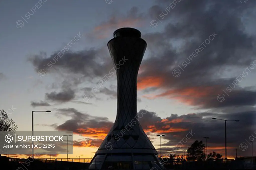 AIR TRAFFIC CONTROL TOWER, EDINBURGH AIRPORT, EDINBURGH, MID LOATHIAN, UNITED KINGDOM, SILLOUETTE OF TOWER WITH COLOURFUL SUNSET, REID ARCHITECTURE