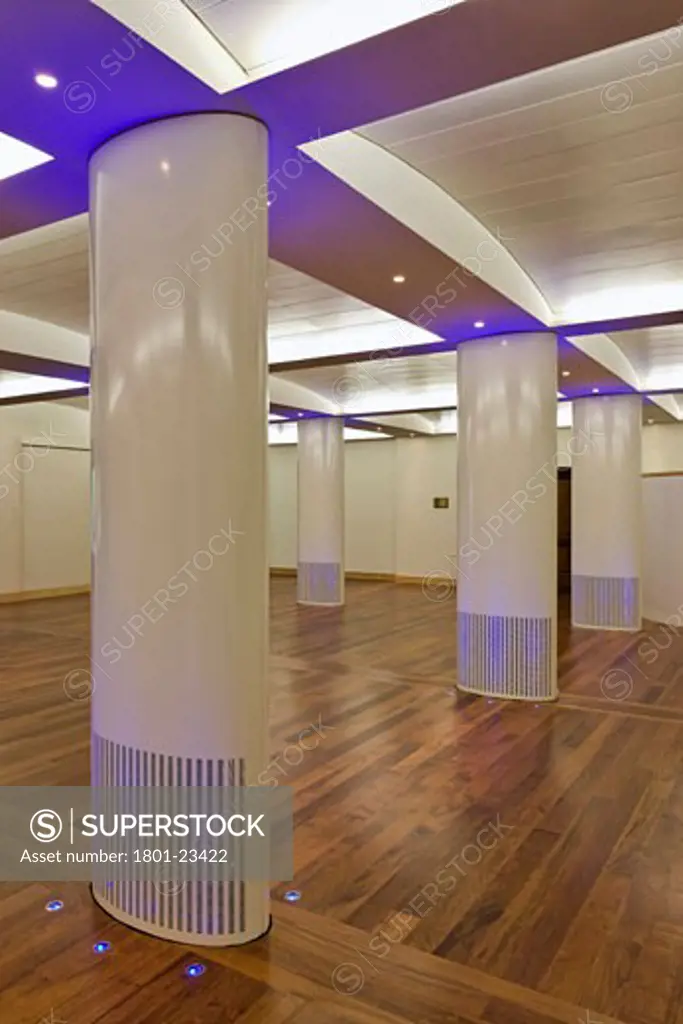 FUNCTION ROOM AT THE ROYAL COLLEGE OF OBSTETRICIANS AND GYNAECOLOGISTS, REGENTS PARK, LONDON, UNITED KINGDOM, INTERIOR SHOWING COLOURED UPLIGHTERS AND COLUMNS, ROBERT POTTER AND PARTNERS