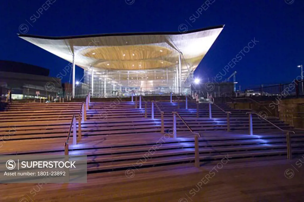 NATIONAL ASSEMBLY OF WALES, CARDIFF BAY, CARDIFF, UNITED KINGDOM, FRONT ELEVATION AT TWILIGHT SHOWING STEPS TO BUILDING, ROGERS STIRK HARBOUR + PARTNERS