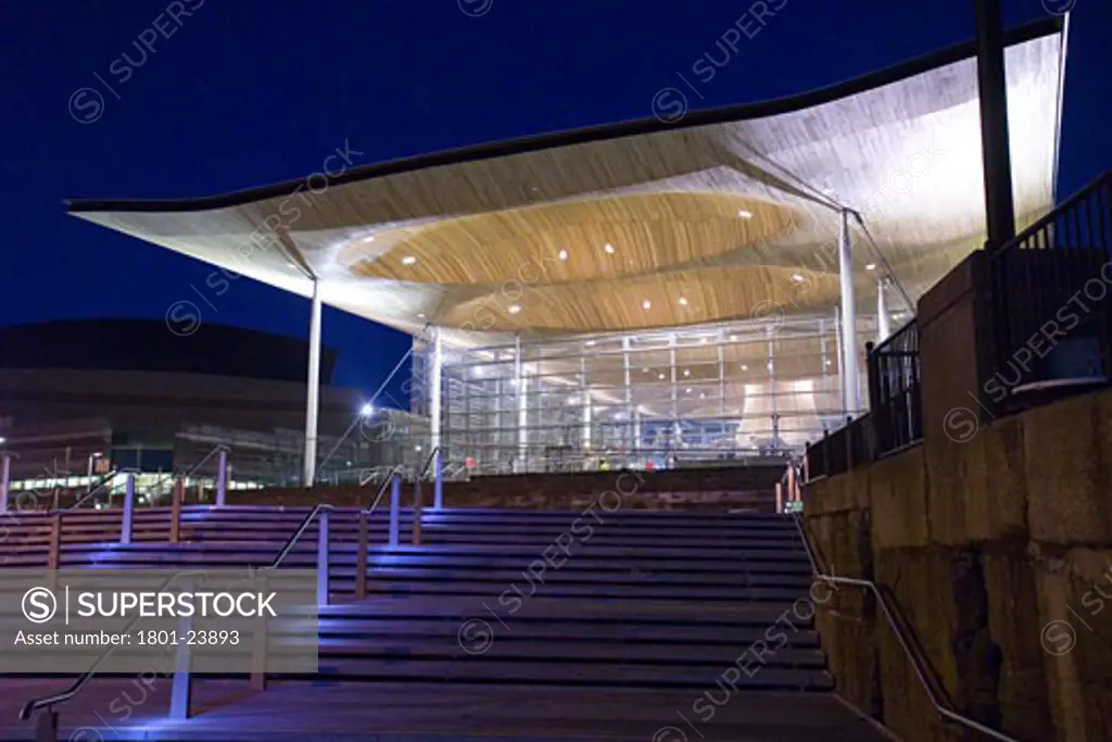 NATIONAL ASSEMBLY OF WALES, CARDIFF BAY, CARDIFF, UNITED KINGDOM, FRONT ELEVATION AT TWILIGHT SHOWING STEPS TO BUILDING, ROGERS STIRK HARBOUR + PARTNERS