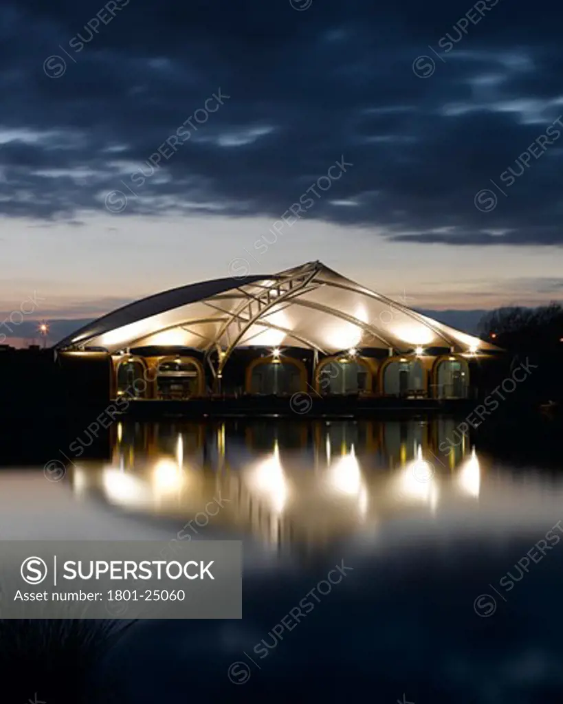 WHITLINGHAM OUTDOOR EDUCATION CENTRE, WHITLINGHAM COUNTRY PARK, NORWICH, NORFOLK, UNITED KINGDOM, DUSK VIEW OF CENTRE WITH LIGHTS ON, SNELL ASSOCIATES