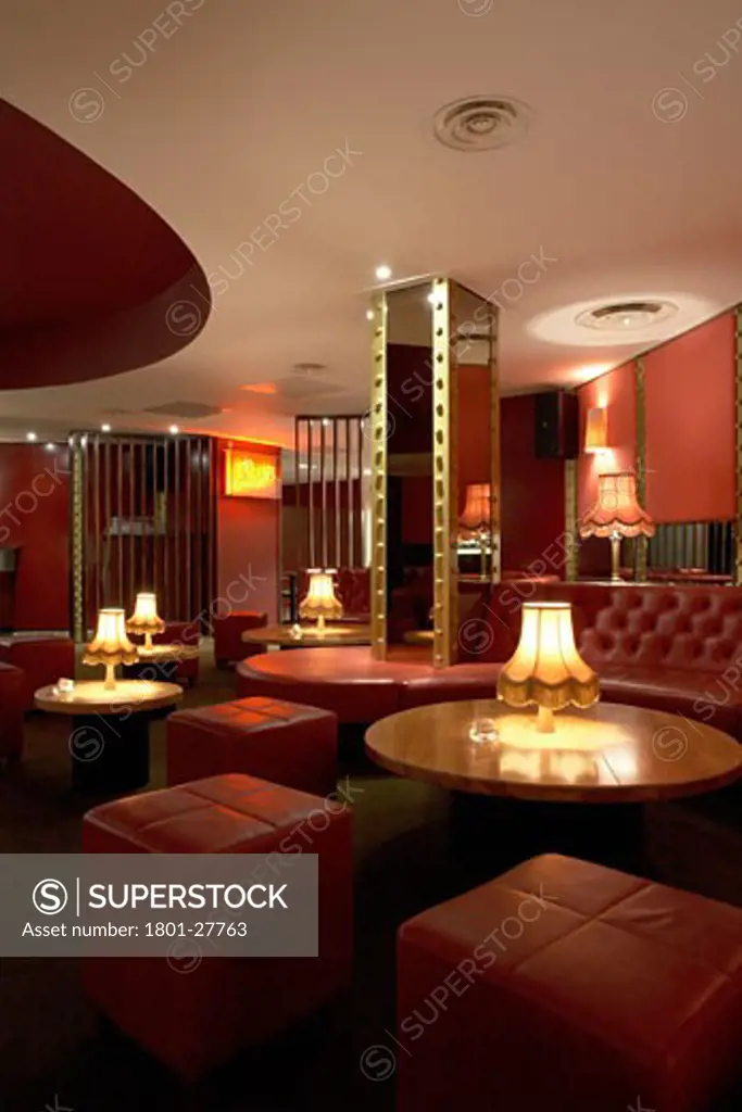 ALL STAR LANES, BLOOMSBURY PLACE, LONDON, WC1 BLOOMSBURY, UNITED KINGDOM, INTERIOR OF THE MAIN BAR AREA SHOWING RED LEATHER UNHOLISTERED SEATING, ARCHITECT UNKNOWN