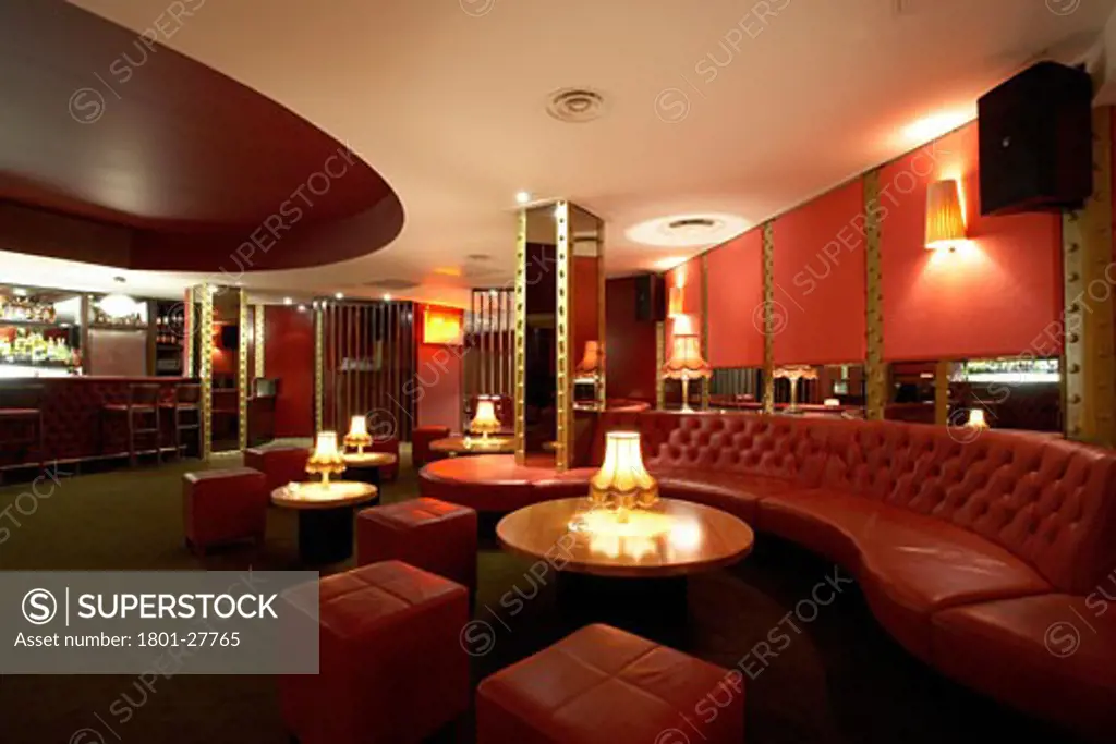 ALL STAR LANES, BLOOMSBURY PLACE, LONDON, WC1 BLOOMSBURY, UNITED KINGDOM, INTERIOR OF THE MAIN BAR AREA SHOWING RED LEATHER UNHOLISTERED SEATING, ARCHITECT UNKNOWN
