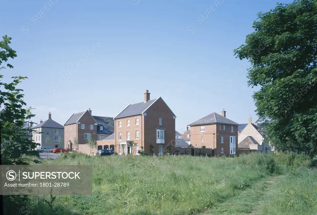 PRIVATE HOUSES, POUNDBURY, DORSET, UNITED KINGDOM, HOUSING SEEN FROM SURROUNDING COUNTRYSIDE, VARIOUS ARCHITECTS