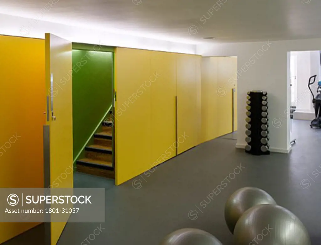 Fitness cafe gym with yellow storage wall., Fitness Cafe, 97 Boundary Road, London, NW8 St John's Wood, United Kingdom, DMD Architects