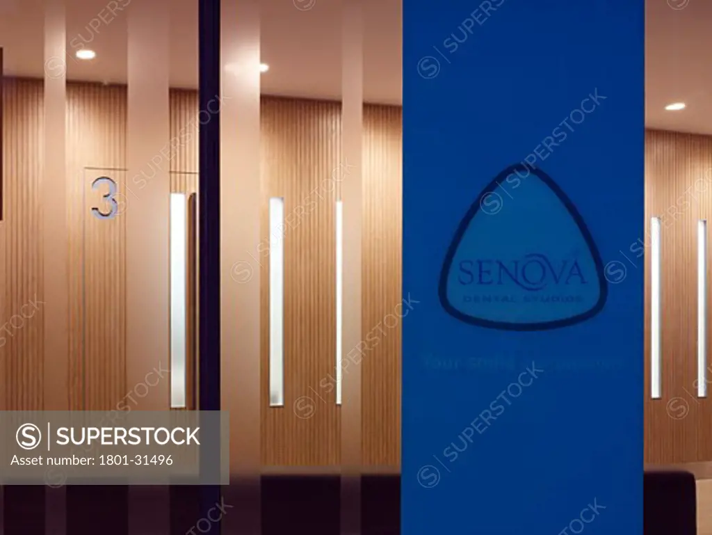 Senova dental studio night timber wall and exterior signage., Senova Dental Studio, 10 Beechen Grove, Watford, Herts, United Kingdom, Flacq Architects