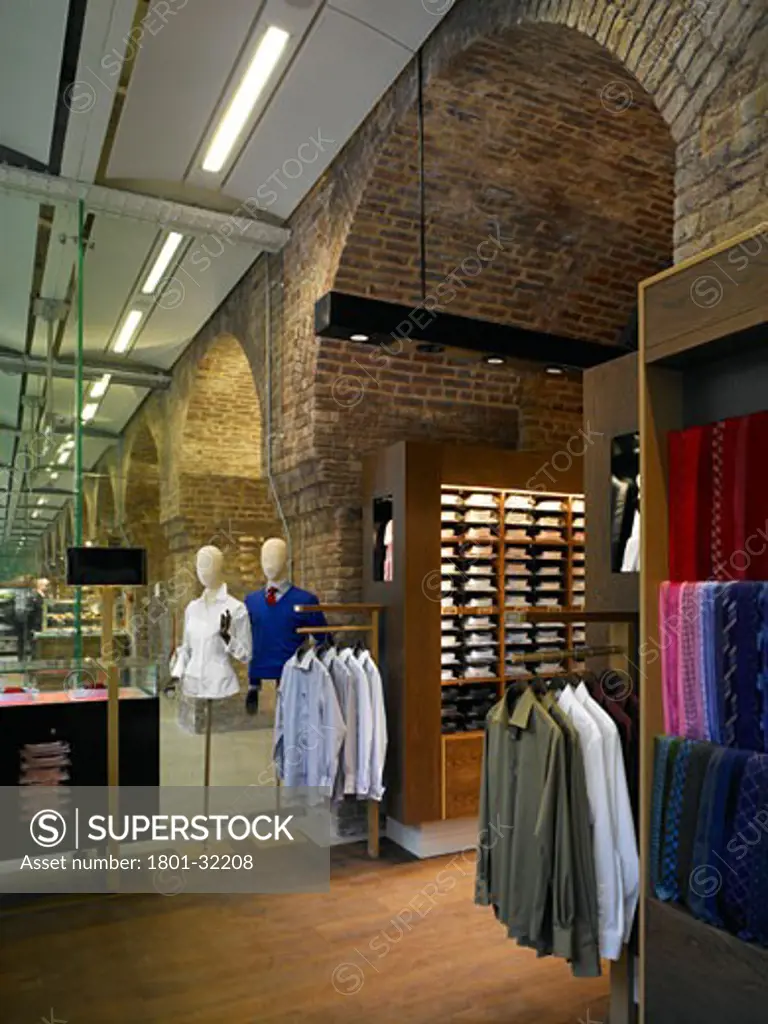 Thomas pink view from front right hand corner of the store to left hand corner showing display units and full hight of the brick arch, Thomas Pink, Unit 6A the Arcade St. Pancras International Station, London, NW1 Camden Town, United Kingdom, Four IV Design