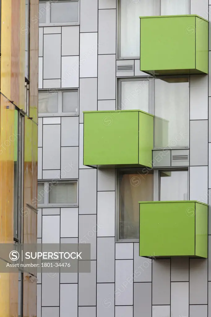 Barking Learning Centre and Apartments, London, United Kingdom, Ahmm Allford Hall Monaghan Morris Llp, Barking central learning centre and apartments green balconies against grey and white tiled elevation.