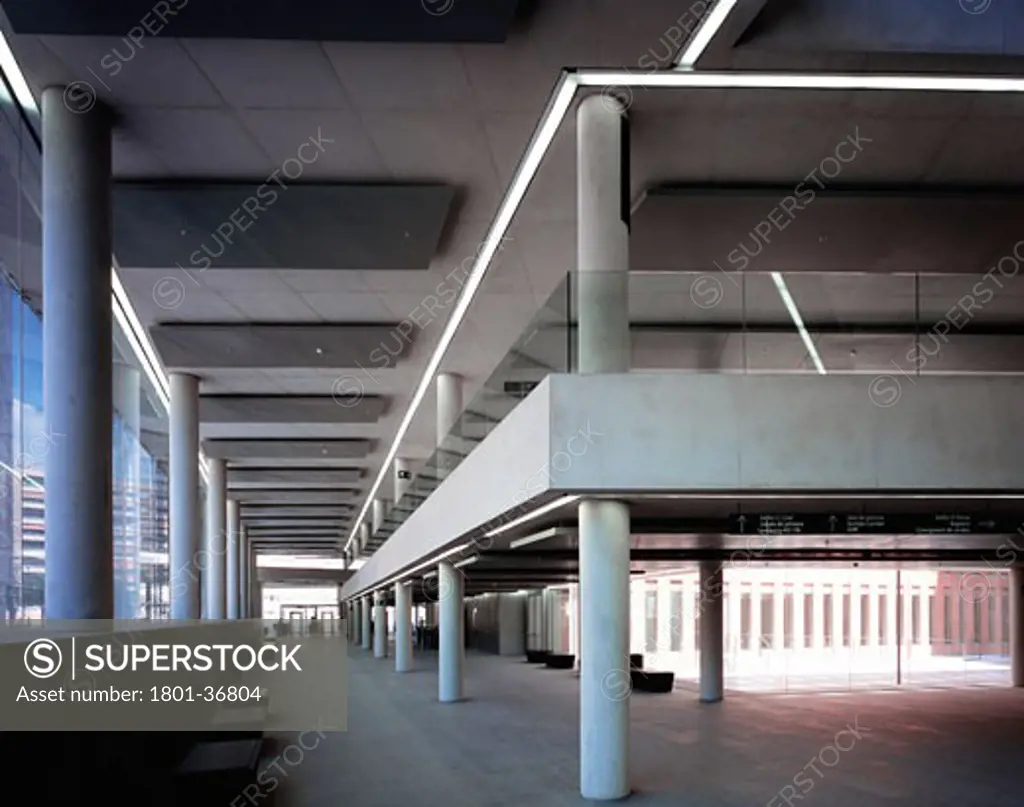 City of Justice, Barcelona, Spain, David Chipperfield, General interior view of atrium showing floor to celing perspective and colums leading towards the rear entrance placed in the west.