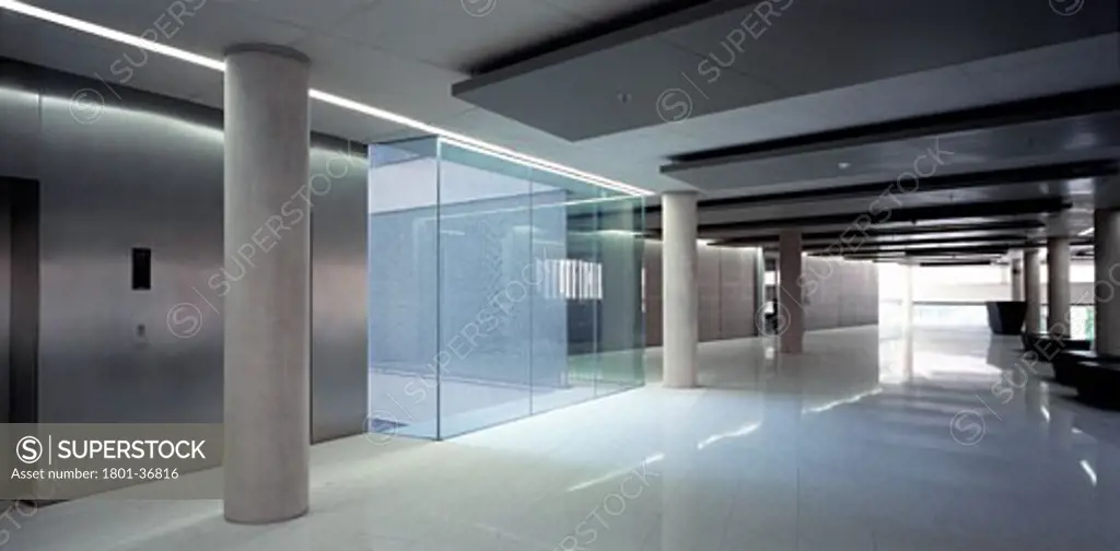 City of Justice, Barcelona, Spain, David Chipperfield, General interior view showing floor to celing perspective and colums with staircase furniture windows and corridors.