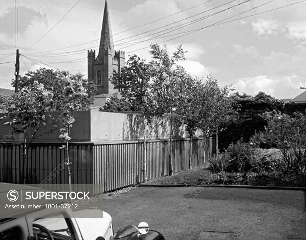 John Dillon Street, Dublin, Ireland, De Paor Architects, John dillon street church yard view with riley (bw).